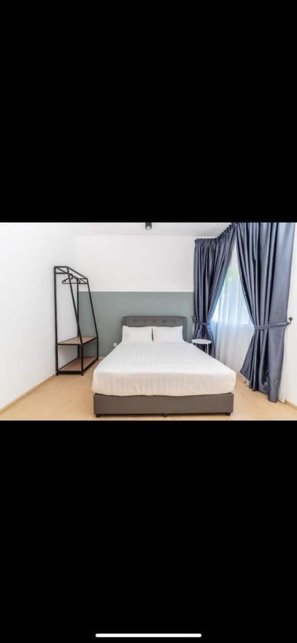Lily Homes Tanah Rata Bagian luar foto