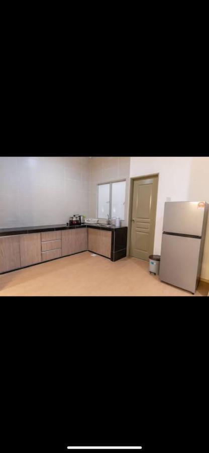 Lily Homes Tanah Rata Bagian luar foto